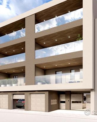 Trivani in costruzione con posto auto