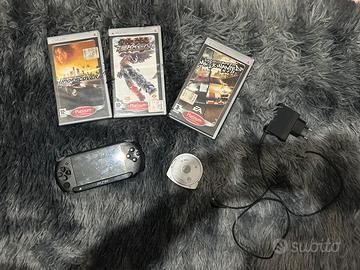 Lotto PSP Sony + 4 Giochi e Caricatore DA RIPARARE