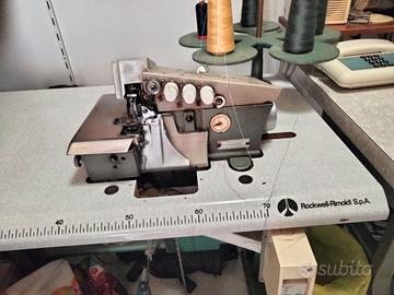 Macchina industriale taglia e cuci funzionante.