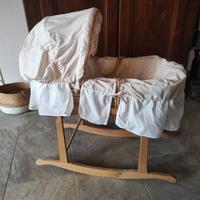 Culla cesta a dondolo in vimini firmata