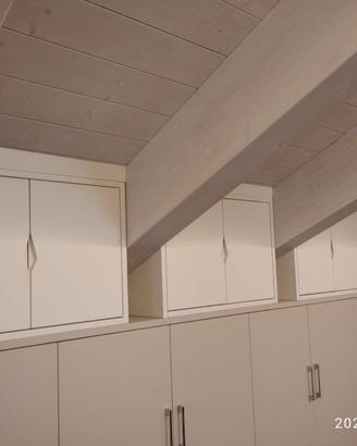 tamponatura con pensili inclinati sotto tetto lacc