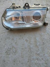 Faro alfa romeo 146 lato guida