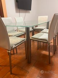 Coordinato tavolo vetro e sedie ecopelle