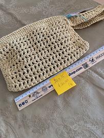 Pochette da polso fatta a mano all'uncinetto