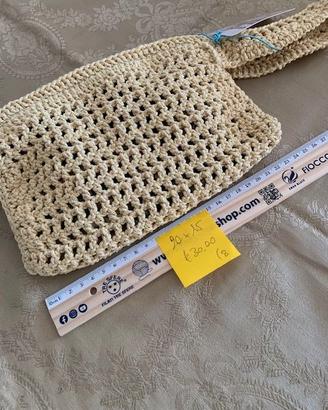 Pochette da polso fatta a mano all'uncinetto