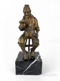 Scultura il bevutore bronzo