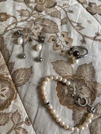 braciale, orecchini, e anello large