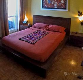 Letto matrimoniale etnico con comodini