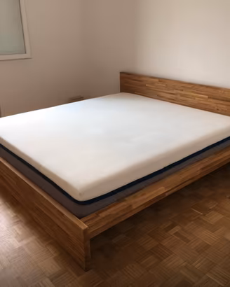 Letto in legno massello di produzione artigianale