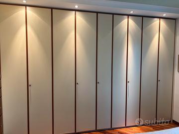 ARMADIO IN LEGNO 9 ANTE