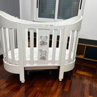 Culla ovale in legno  con materasso e parabordi