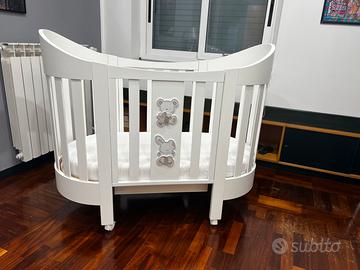 Culla ovale in legno  con materasso e parabordi