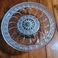 Elegante alzata dallo stile classico e raffinato