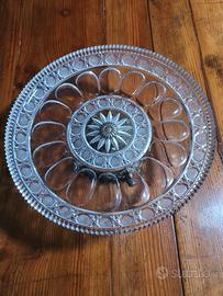 Elegante alzata dallo stile classico e raffinato