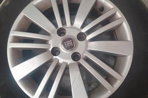 4 cerchi in lega  con gomme fiat grande punto