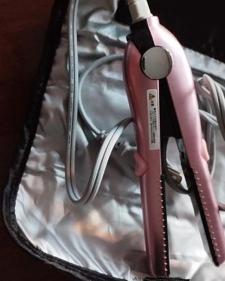 Piccola piastra per capelli con custodia 