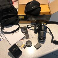 Nikon D3100, corpo + obiettivo + borsa