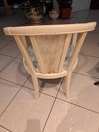 sedia con bambola in ceramica