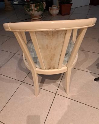 sedia con bambola in ceramica