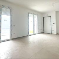 Trilocale di nuova costruzione con cortile e posto