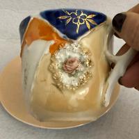 Antica tazza in porcellana