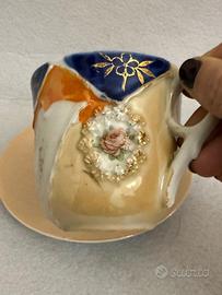 Antica tazza in porcellana