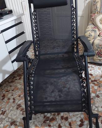 sedia nera a dondolo nuova 