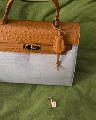 Borsa  vintage in pelle e tella