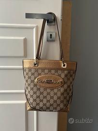Borsa Gucci in pelle metallizzata bronzo e canvas