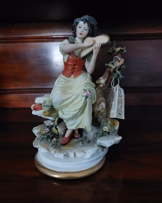 Statuina in porcellana capodimonte scultore Walter