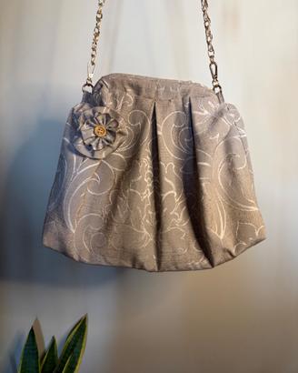 Borsa con dettaglio fiore