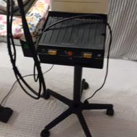 Ferro e asse da stiro aspirante