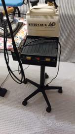 Ferro e asse da stiro aspirante