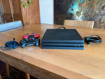 PS4 pro, 2 controller, 8 giochi