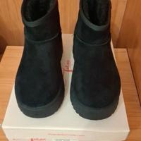 Stivaletto finta pelliccia platform 