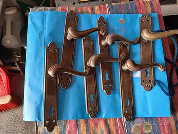 Maniglie porta in bronzo