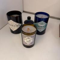 Candele con bottiglie gin