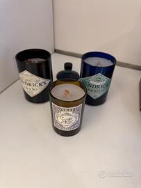 Candele con bottiglie gin