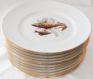 Servizio di piatti da pesce in porcellana Ginori.