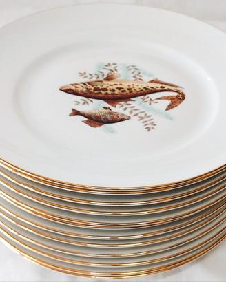 Servizio di piatti da pesce in porcellana Ginori.