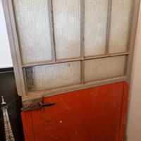 Porta in ferro semi vetrata