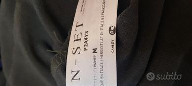 abito donna color verde militare con decorazioni