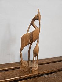 Statuetta Indonesia in legno raffigurante uccelli