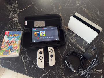 Nintendo Swicht OLED + custodia rigida + gioco dig