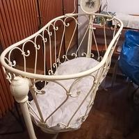 Culla a dondolo antica in ghisa fine '800 