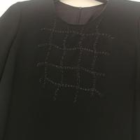 Vestito a tubino nero con perline