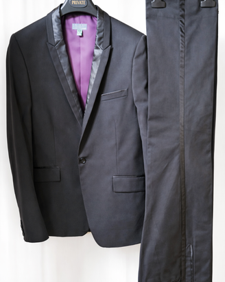 Abito nero elegante stile smoking c/revers