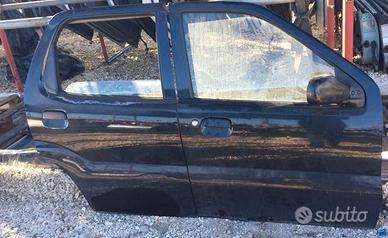 SUZUKI IGNIS PORTE ANT E POST 03-08