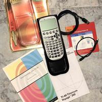 Calcolatrice Grafica TI-89 Titanium + 2 Libri