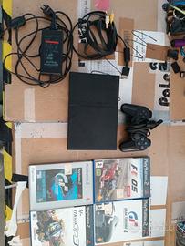 PS2 con vari giochi 